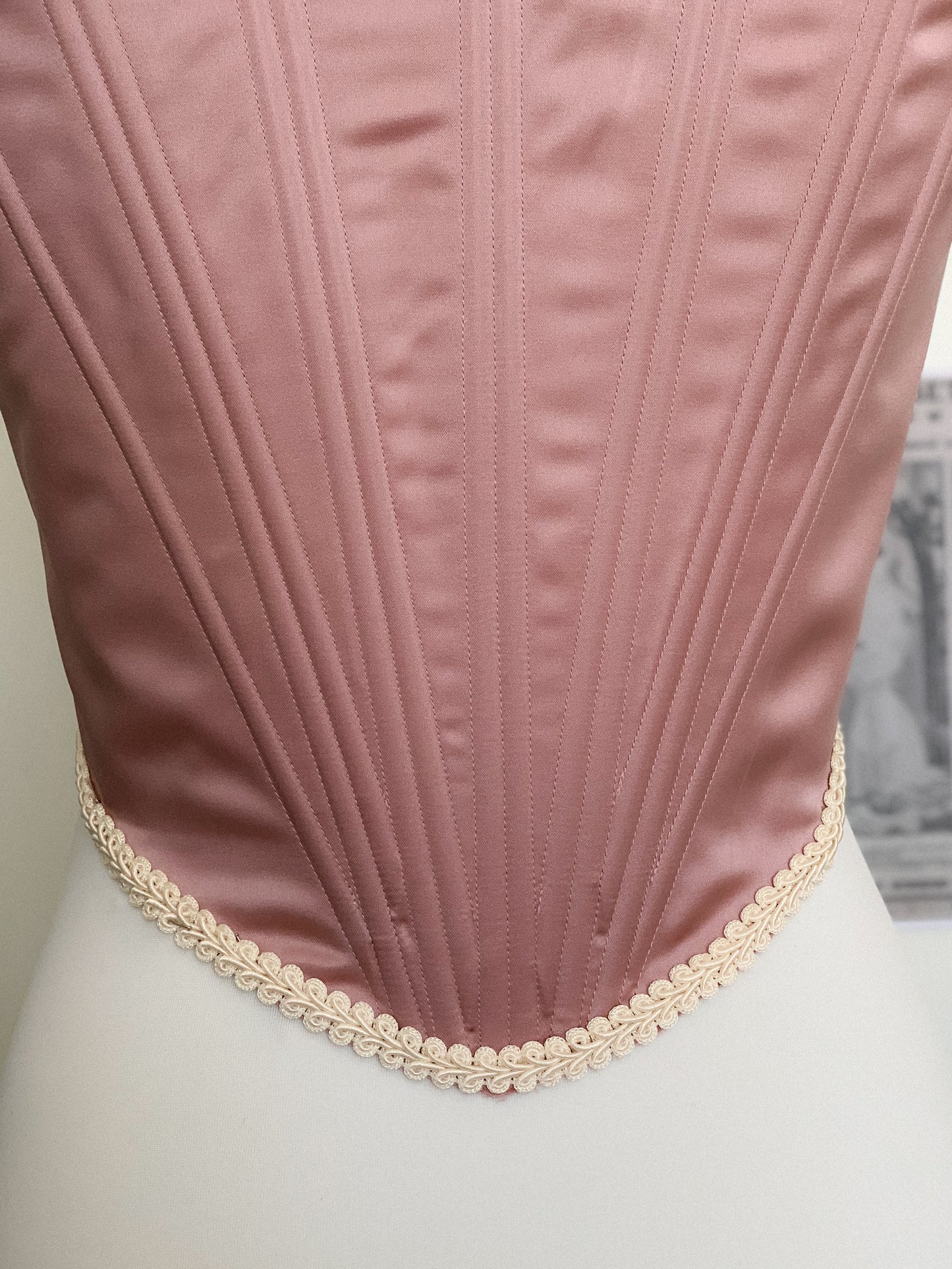 Pink corset with off-shoulder sleeves